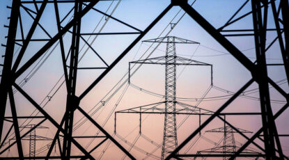 Photo of transmission towers - The Grid Capacity Crunch: Why Utilities Are Turning to Behind-the-Meter Onsite Power