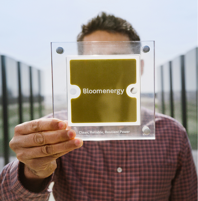 Person holding a Bloom Energy fuel cell