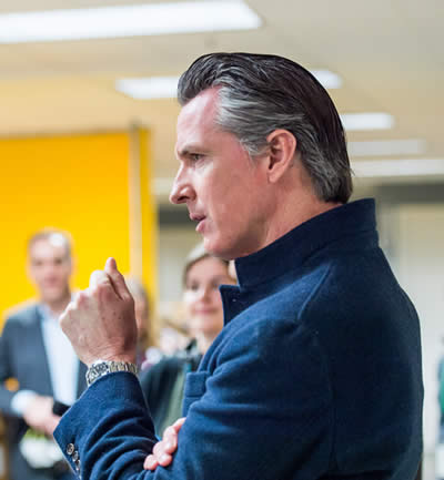 Governor Gavin Newsom takes a tour of the Bloom Energy Sunnyvale manufacturing facility on Mar. 28, 2020, which currently serves as a ventilator refurbishing site.